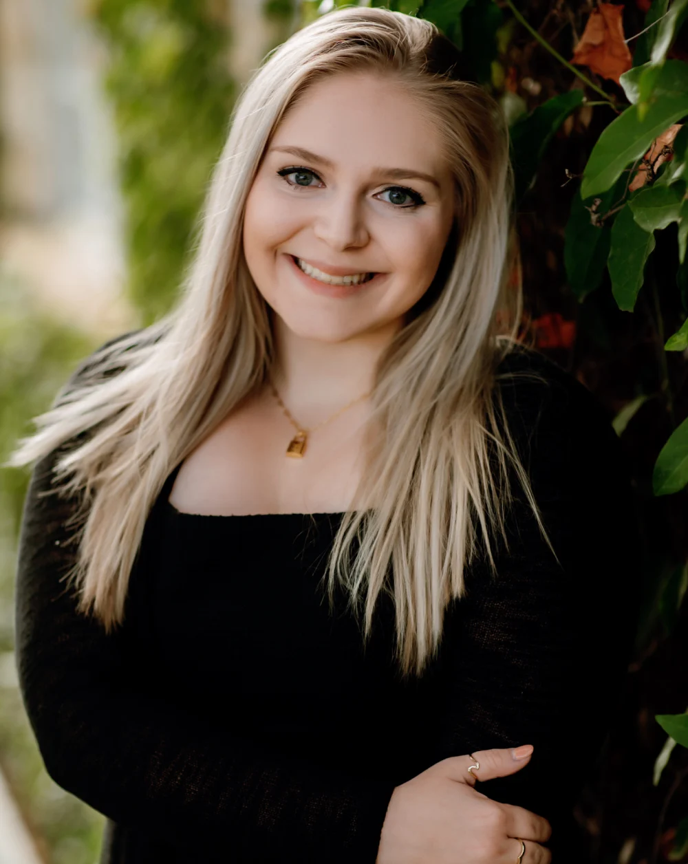 Smiling blonde woman posing for photo | Frisco's Premier Orthodontics